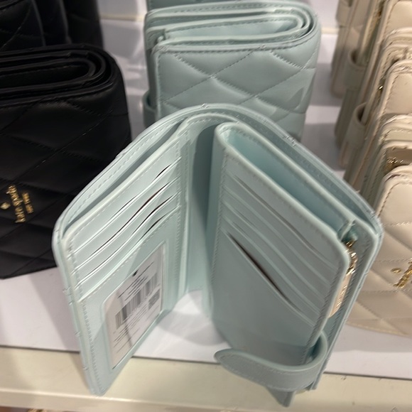 Kate Spade Carey Medium Compartment Bifold Wallet
COLOR: Turquoise - Picture 8 of 16